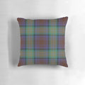 Soft, plaid pillow in shades of purple, green, and brown featuring the iconic Isle of Skye tartan pattern.