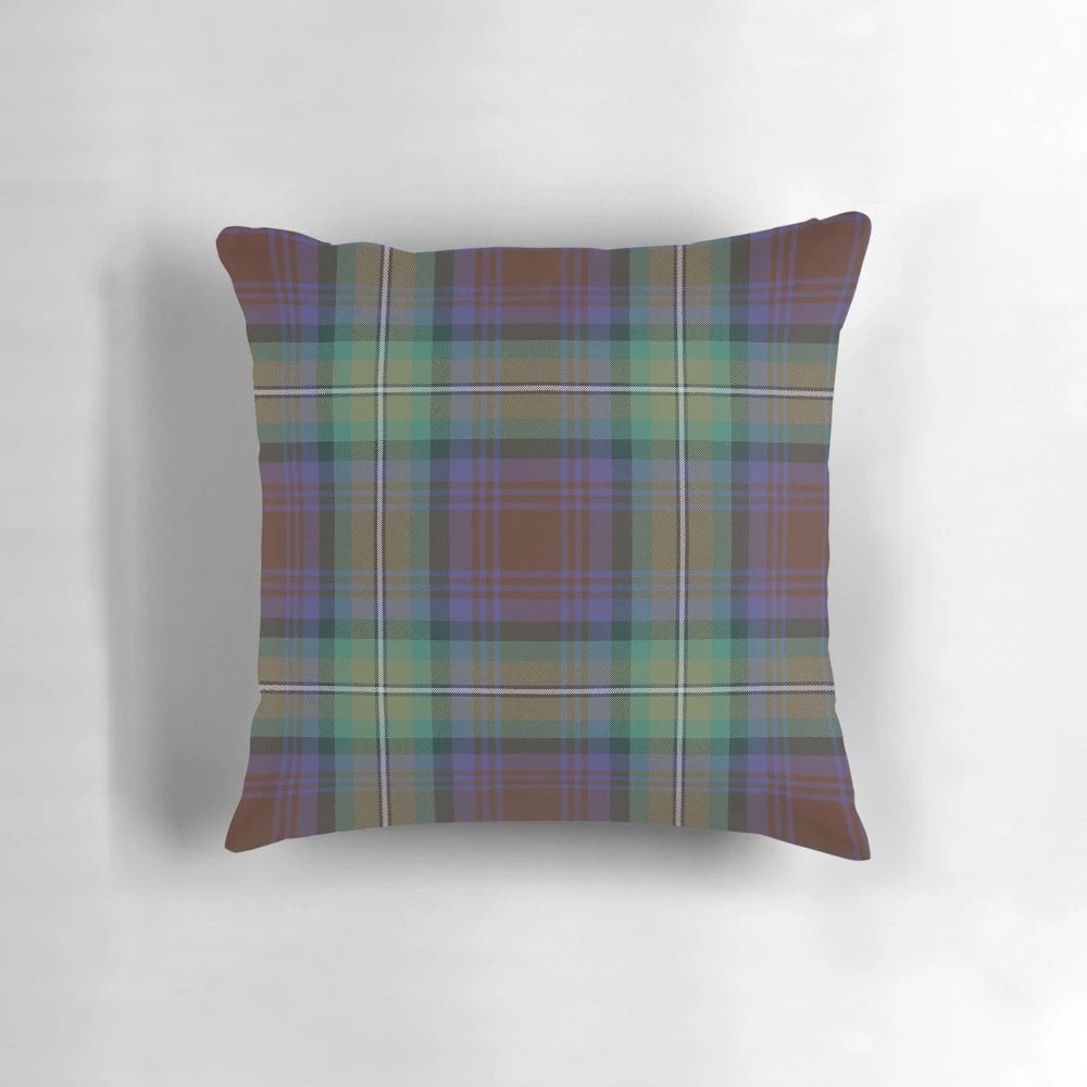 Soft, plaid pillow in shades of purple, green, and brown featuring the iconic Isle of Skye tartan pattern.