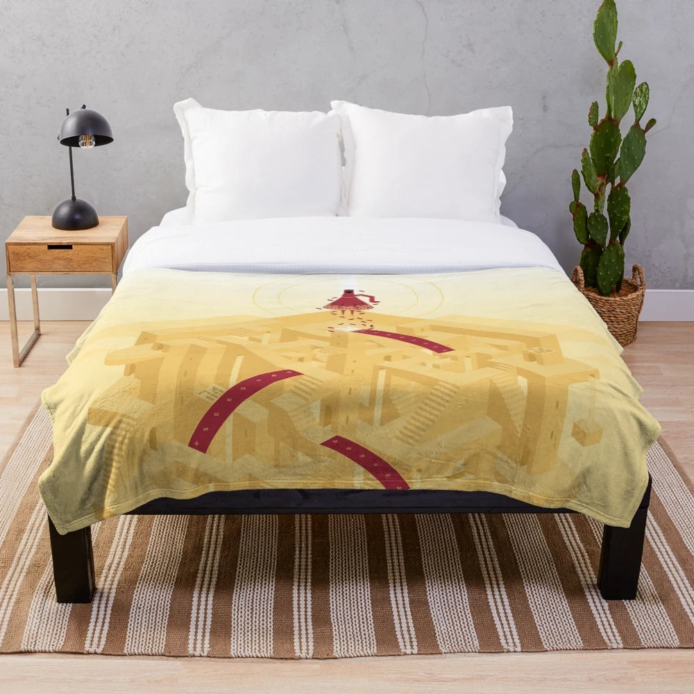 Plush blanket featuring an isometric design inspired by the game Monument Journey