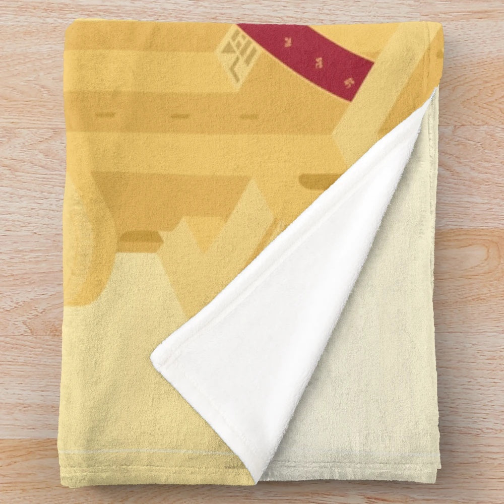 Plush blanket featuring an isometric design inspired by the game Monument Journey