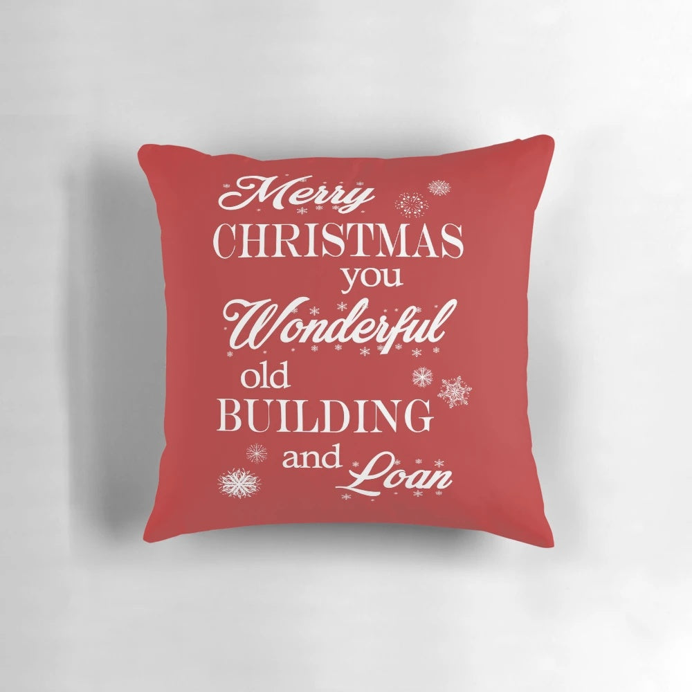 Cozy 'It's a Wonderful Life' Building and Loan Christmas Movie Pillow featuring iconic scenes and characters