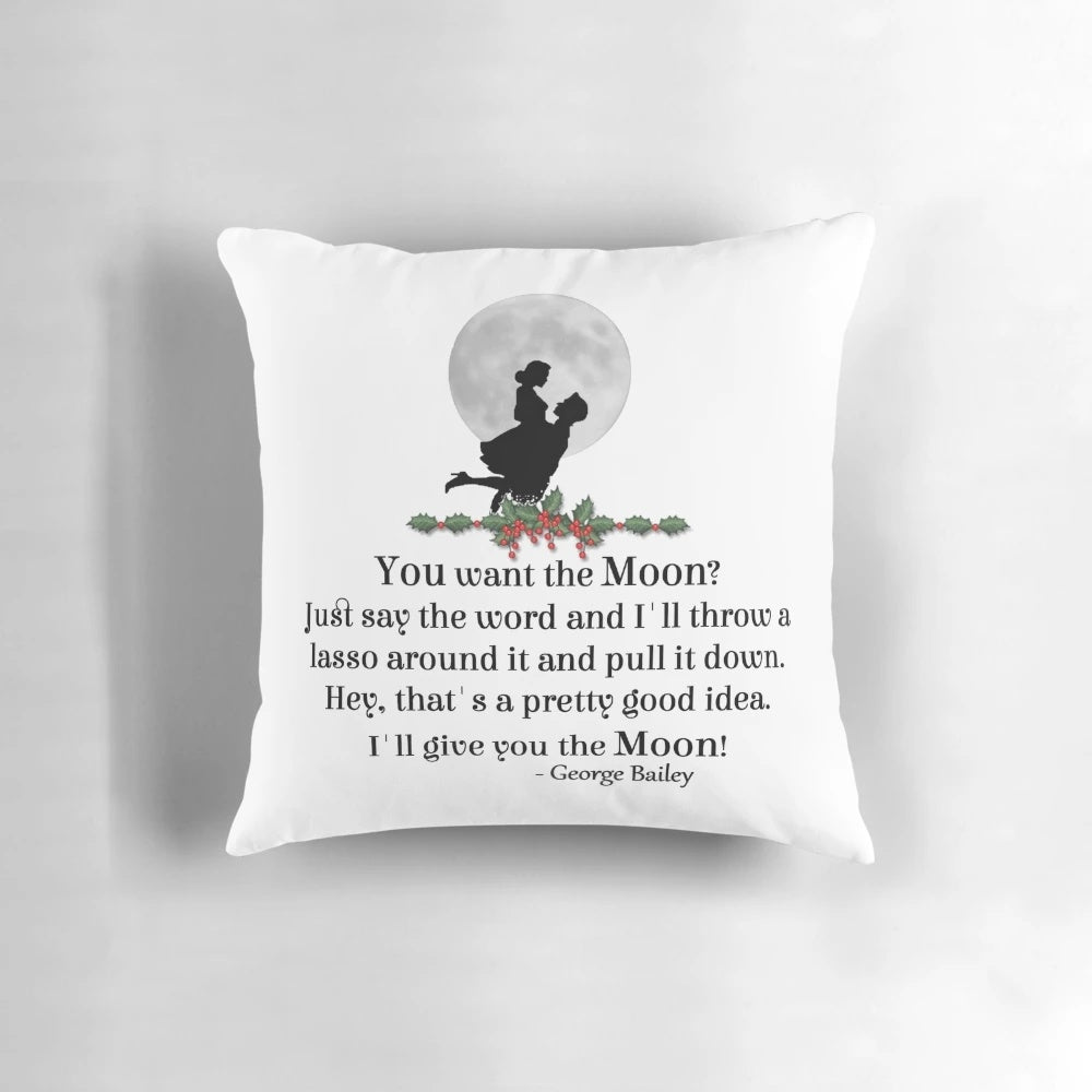 A plush decorative pillow featuring a silhouette of George Bailey from the classic Christmas movie "It's a Wonderful Life" against a crescent moon.