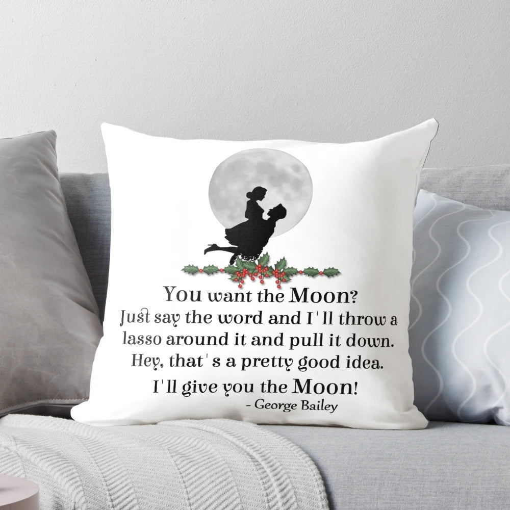 A plush decorative pillow featuring a silhouette of George Bailey from the classic Christmas movie "It's a Wonderful Life" against a crescent moon.
