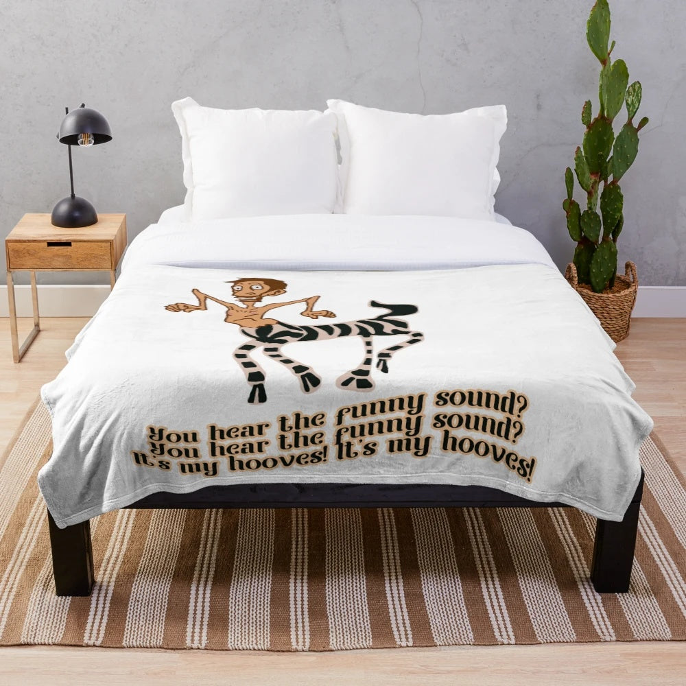 Soft and cozy plush blanket featuring the iconic "IT'S MY HOOVES" design from cult classic movies