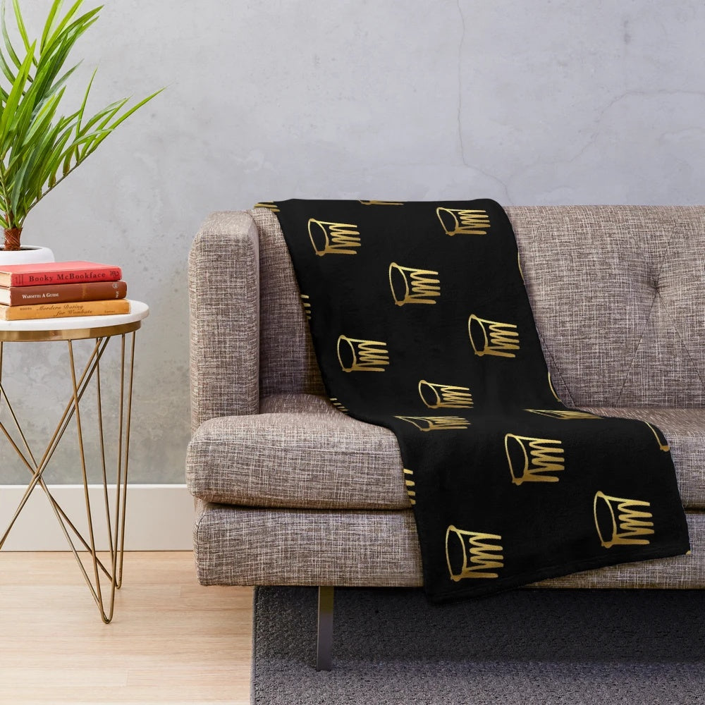 Soft and plush blanket featuring the j cole gold crown design