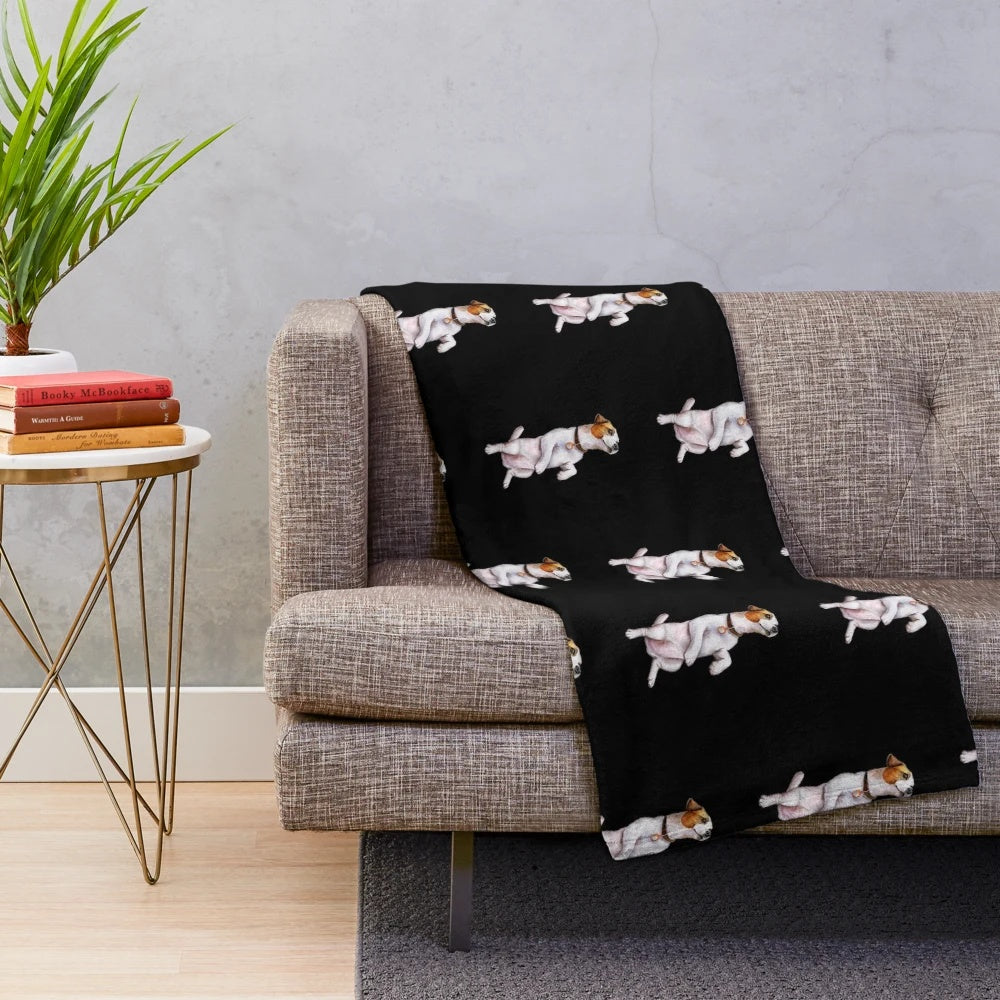A soft and cuddly plush blanket featuring a playful Jack Russell Terrier design