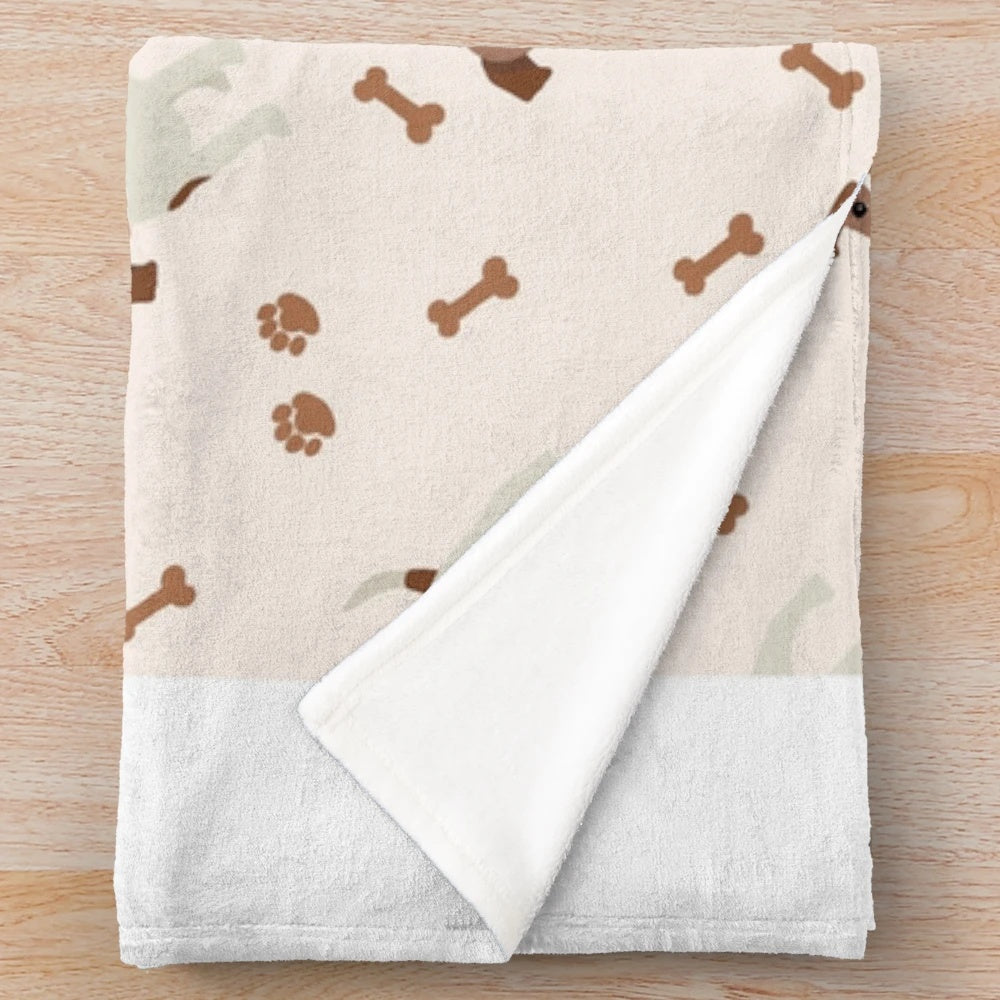 Jack Russell Terrier dog on a plush blanket