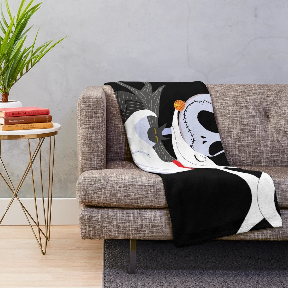 A cozy plush blanket featuring the character Jack Skellington from the movie The Nightmare Before Christmas