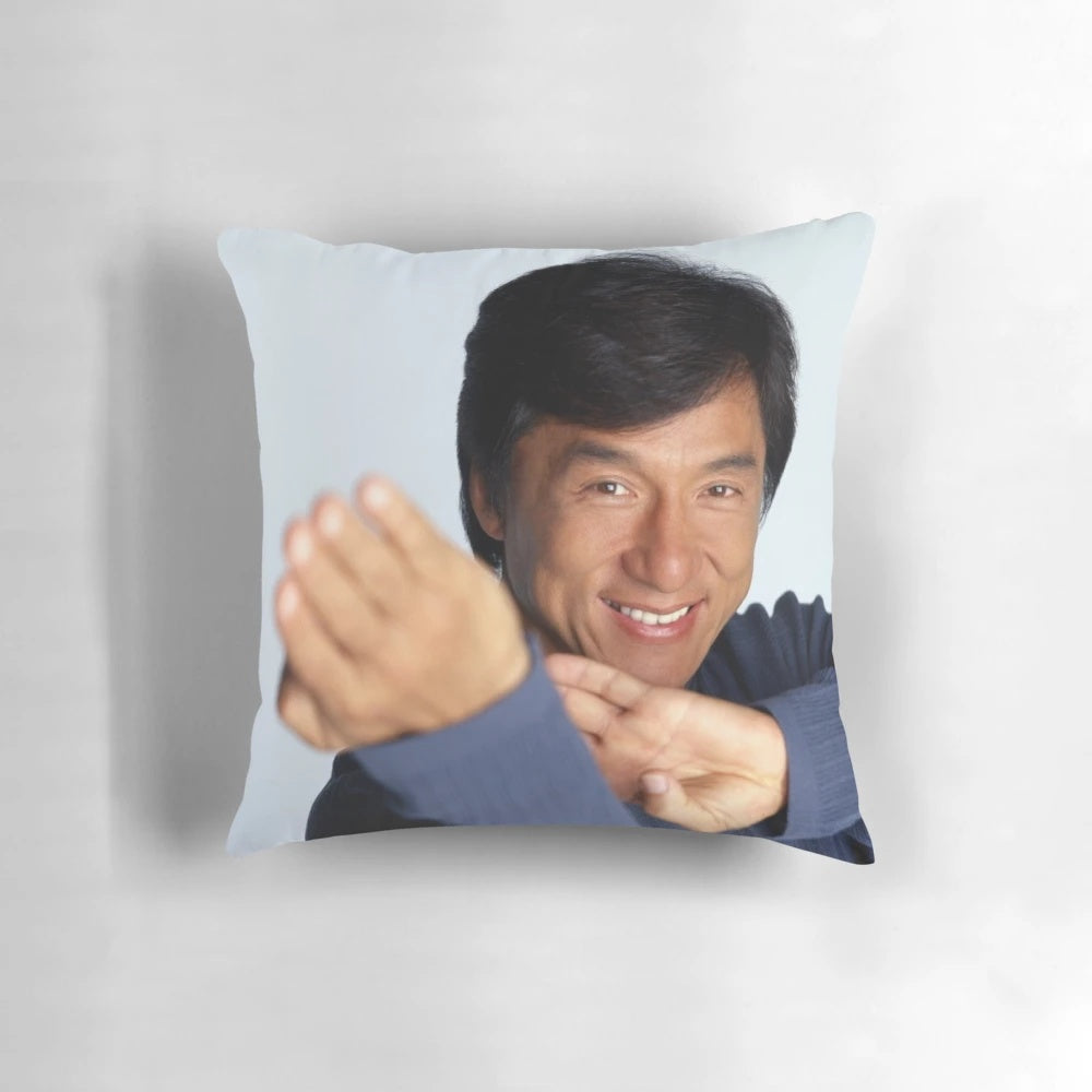 Soft, plush pillow with an illustration of a smiling Jackie Chan