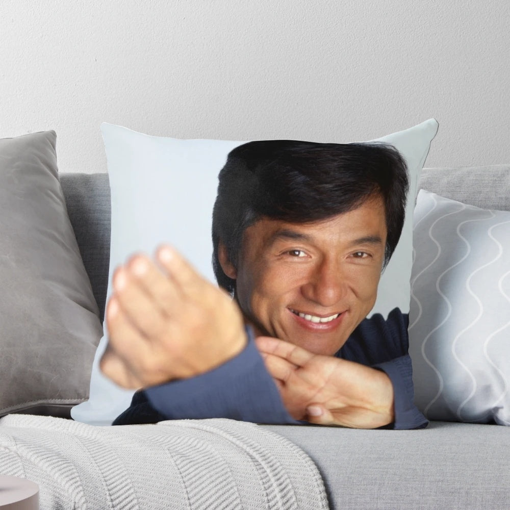 Soft, plush pillow with an illustration of a smiling Jackie Chan