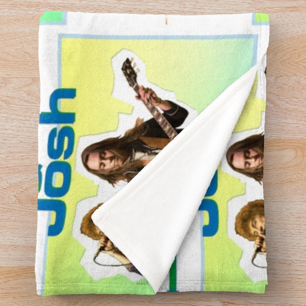 A plush blanket featuring the likenesses of Jake and Josh, inspired by popular culture