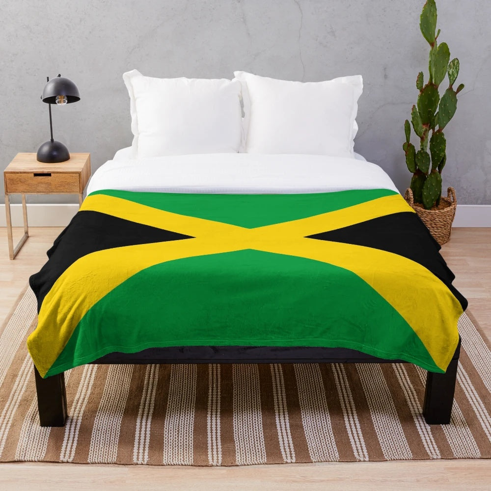 Plush blanket featuring the vibrant colors and design of the Jamaican national flag