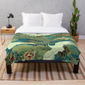 Teal blue plush blanket with Japanese crane bird and landscape design