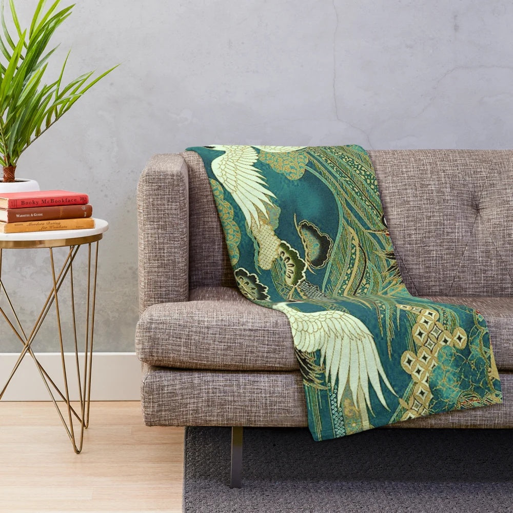 Teal blue plush blanket with Japanese crane bird and landscape design