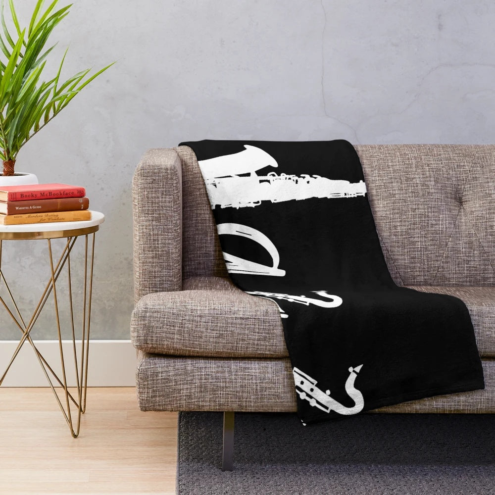 Jazz-themed plush blanket with musical instruments