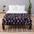 Jellyfish plush blanket featuring a variety of marine life designs
