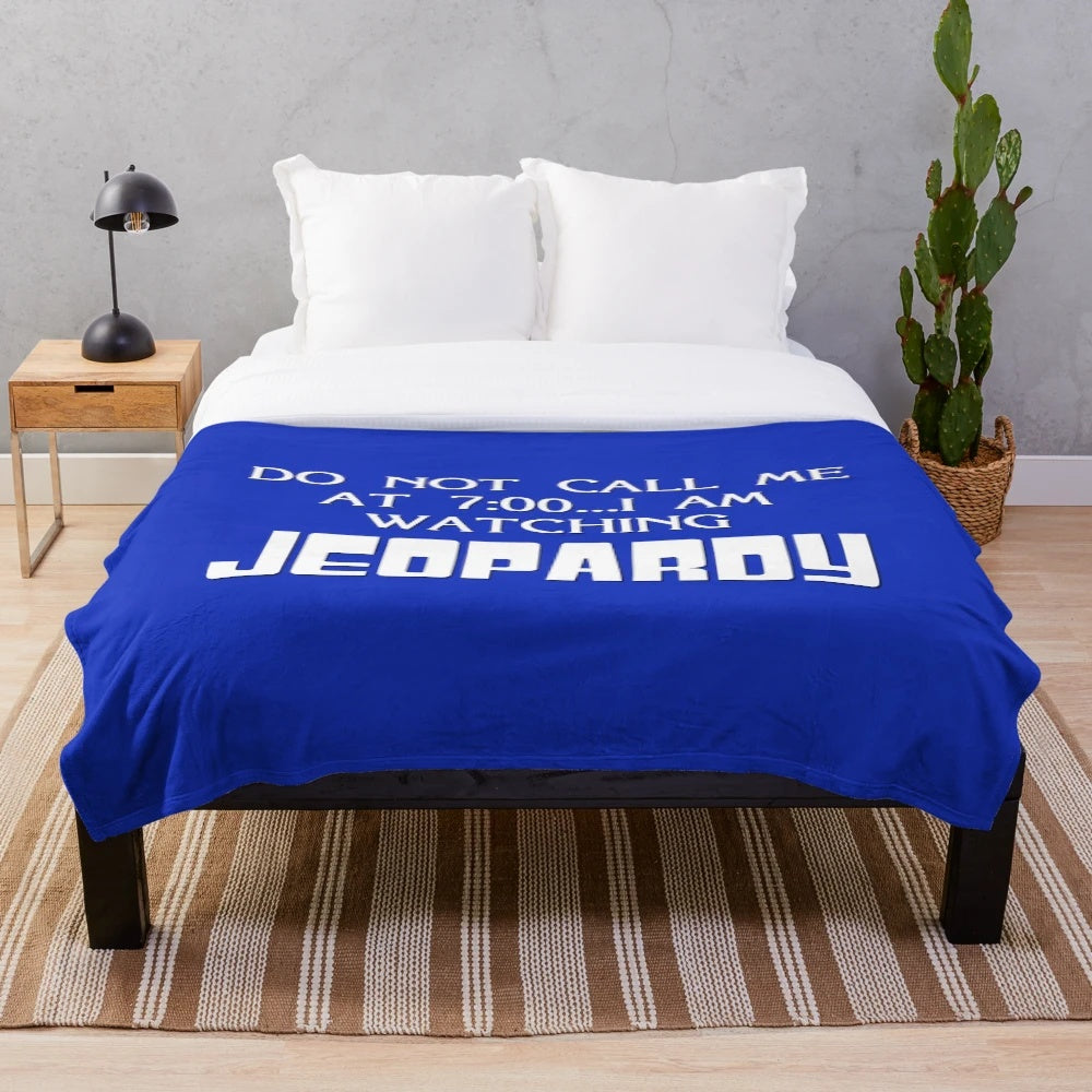 Plush blanket featuring the Jeopardy game show logo and design