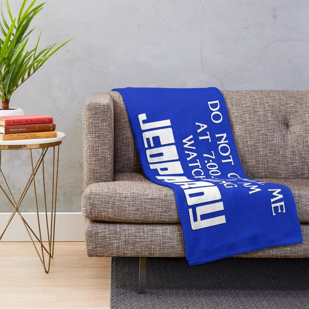 Plush blanket featuring the Jeopardy game show logo and design