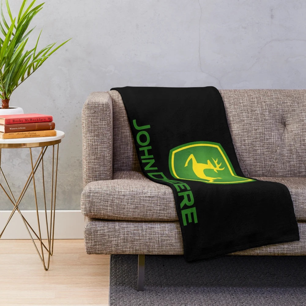 John Deere-inspired plush blanket with tractor and farm motifs