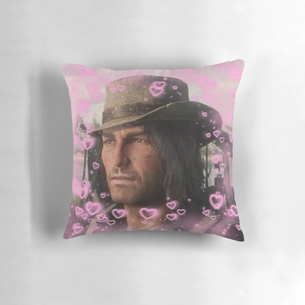 A plush, heart-shaped pillow featuring the character John Marston from the Red Dead Redemption video game series.