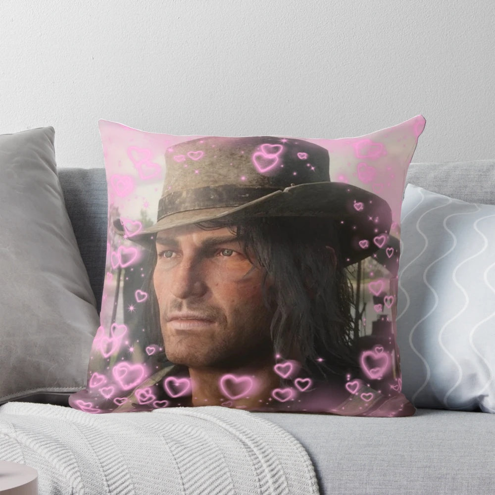 A plush, heart-shaped pillow featuring the character John Marston from the Red Dead Redemption video game series.