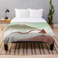 Journey plush blanket featuring a desert landscape