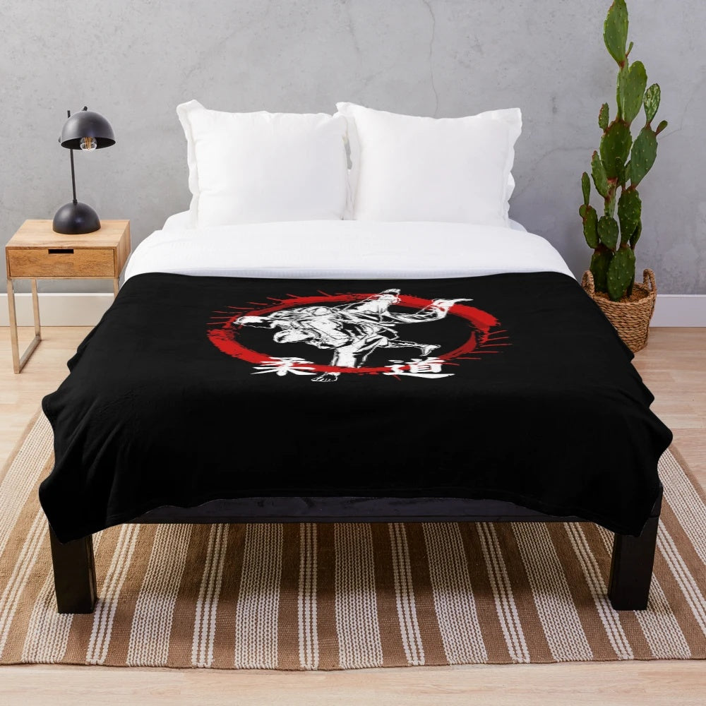 Soft and comfortable plush blanket featuring a judo or judoka design for martial arts and sports fans