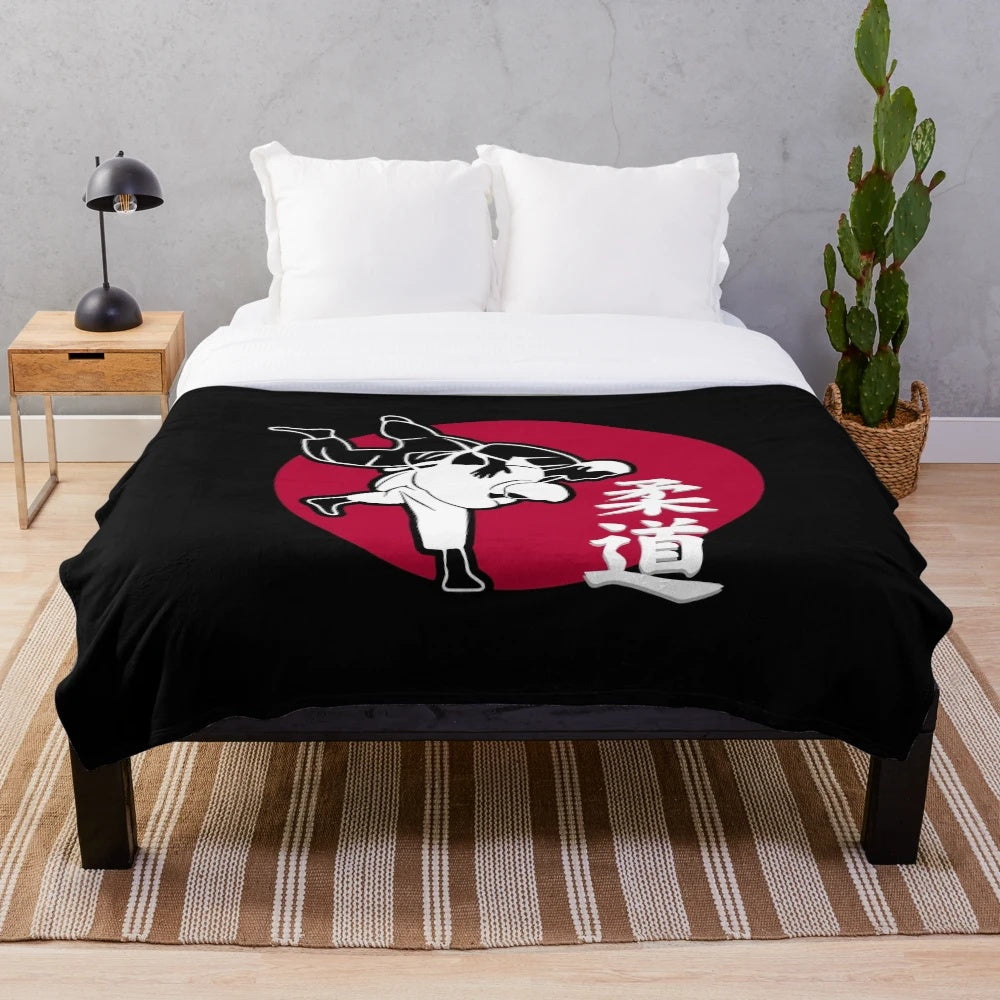 Judo plush blanket with a red and black design