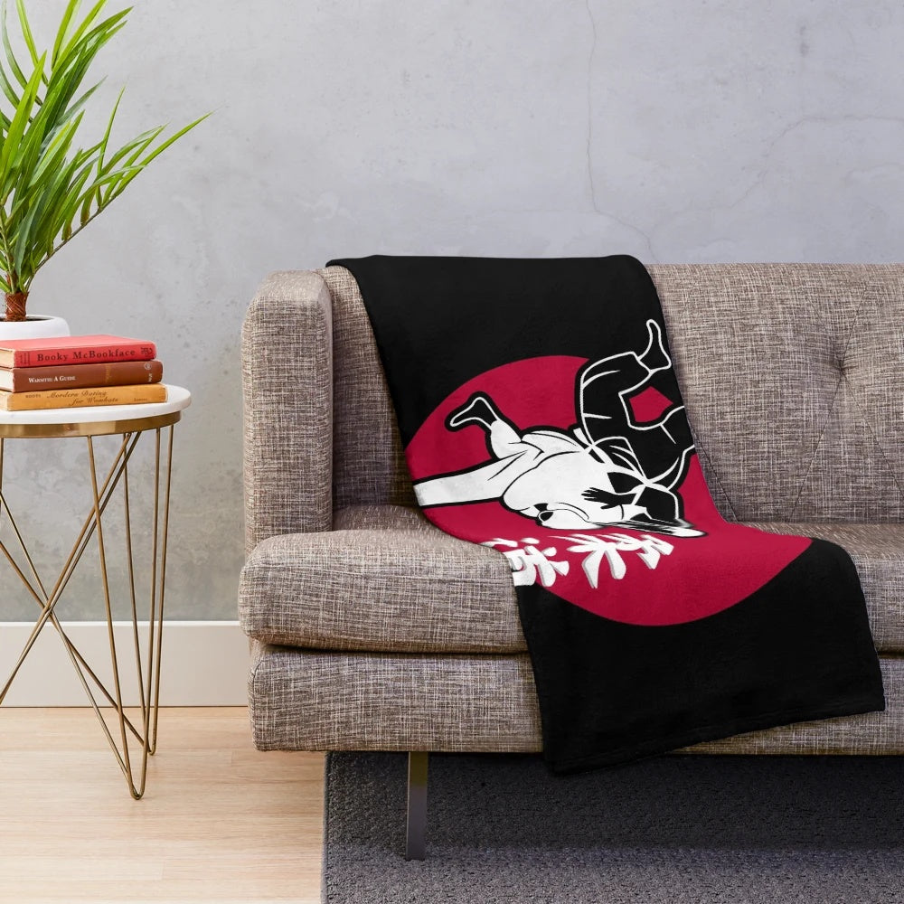 Judo plush blanket with a red and black design