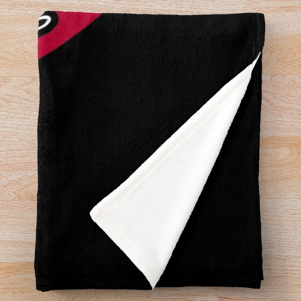 Judo plush blanket with a red and black design
