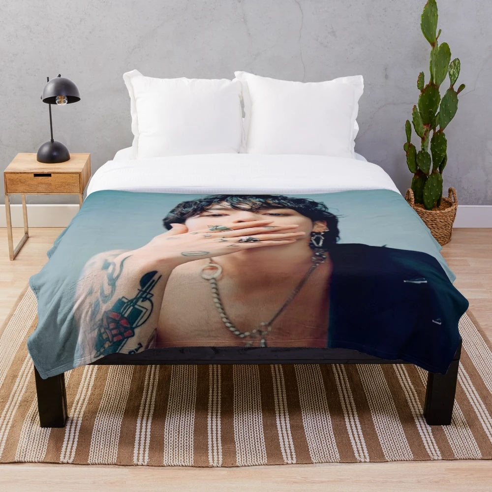 Jungkook-themed plush blanket with soft, cozy material