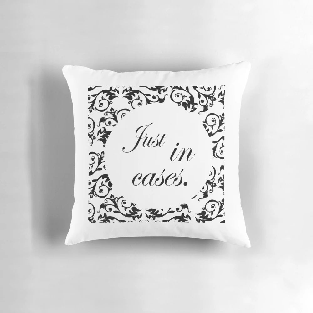 A black and white "Just in Cases" pillow featuring romantic movie quotes and words of love