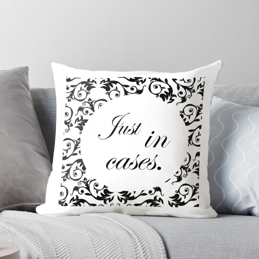 A black and white "Just in Cases" pillow featuring romantic movie quotes and words of love
