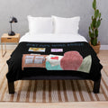 Sewing-themed plush blanket featuring "Just One More Stitch!" design