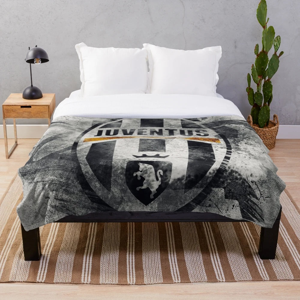 Juventus-inspired plush blanket with soft, cozy design