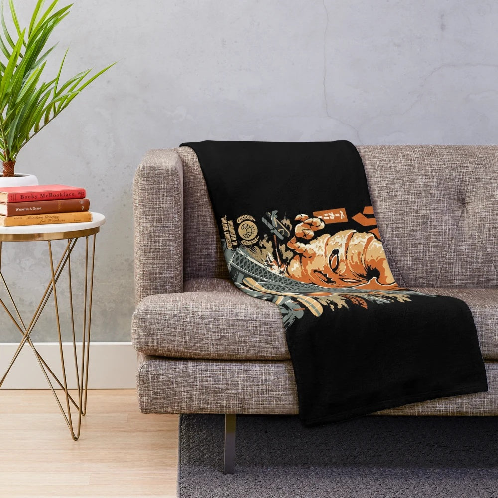 Plush blanket featuring a kaiju-inspired croissant design