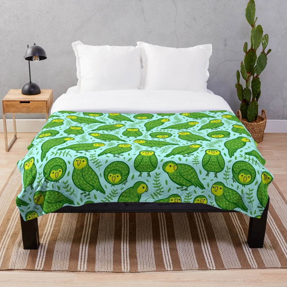 Kakapo Plush Blanket featuring a cartoon design of the endangered New Zealand bird