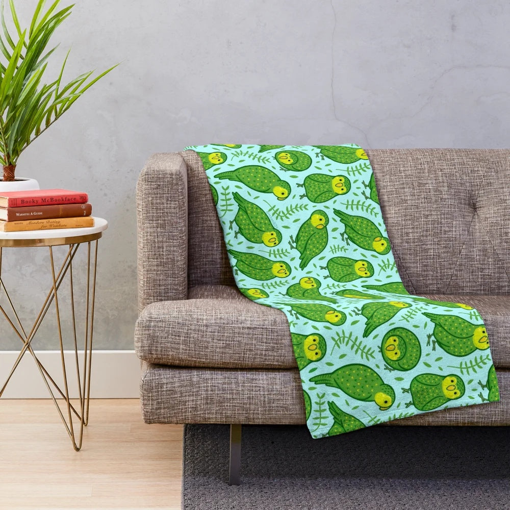 Kakapo Plush Blanket featuring a cartoon design of the endangered New Zealand bird
