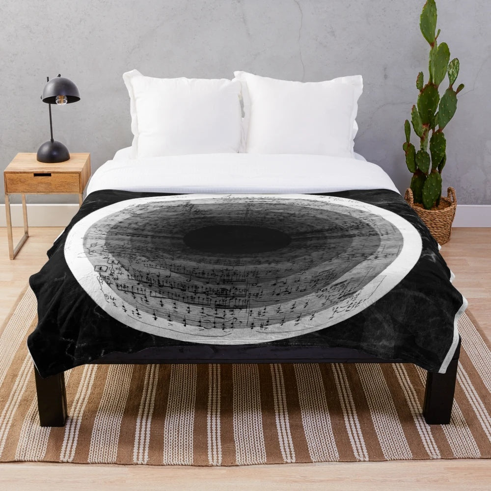 Cozy plush blanket with a kaleidoscope-inspired digital art design