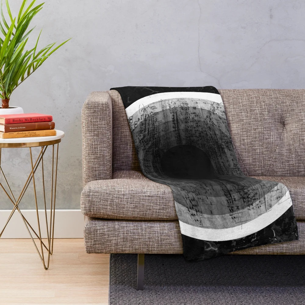 Cozy plush blanket with a kaleidoscope-inspired digital art design