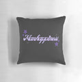 A lavender-colored pillow featuring a starry night design, perfect for Kansas State University fans.