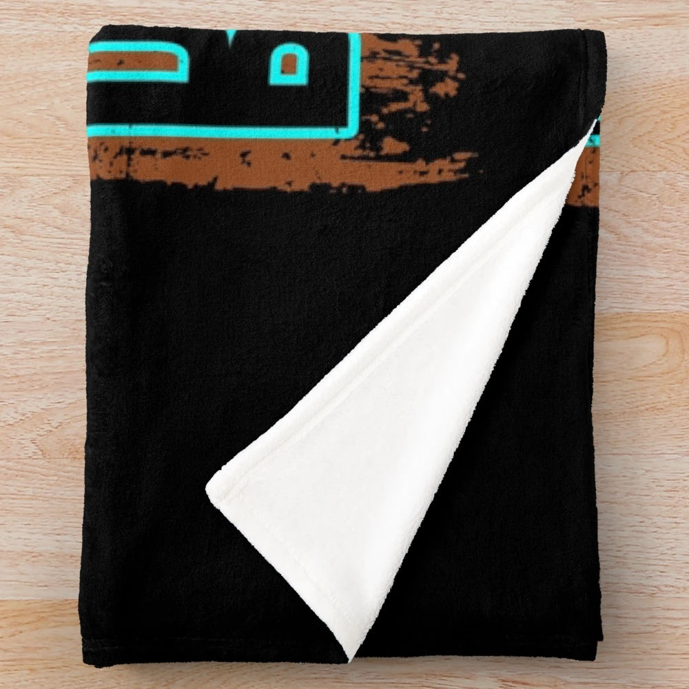 Plush blanket with karate fighter silhouette design