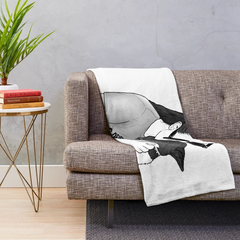 Katie McGrath and her dog on a soft, plush blanket