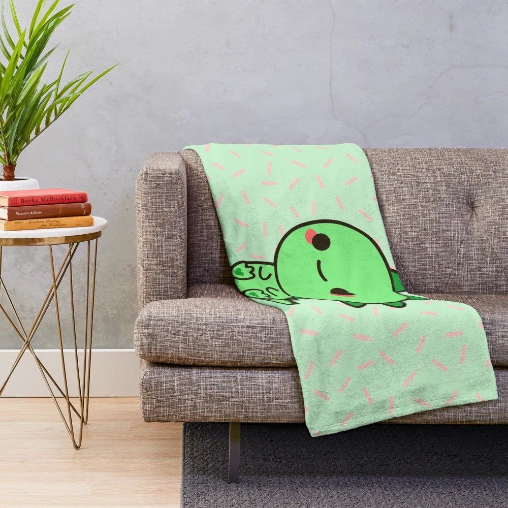 Colorful plush dinosaur blanket with kawaii design