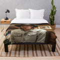 Kayce Dutton plush blanket with a cozy, western-inspired design