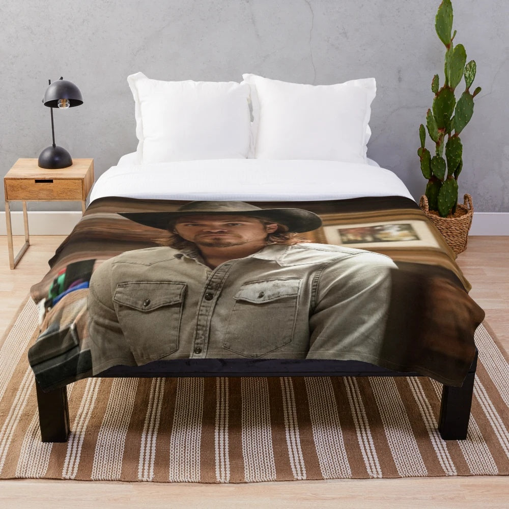 Kayce Dutton plush blanket with a cozy, western-inspired design