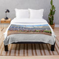 Kentucky Derby-themed plush blanket featuring horses and the Churchill Downs racetrack