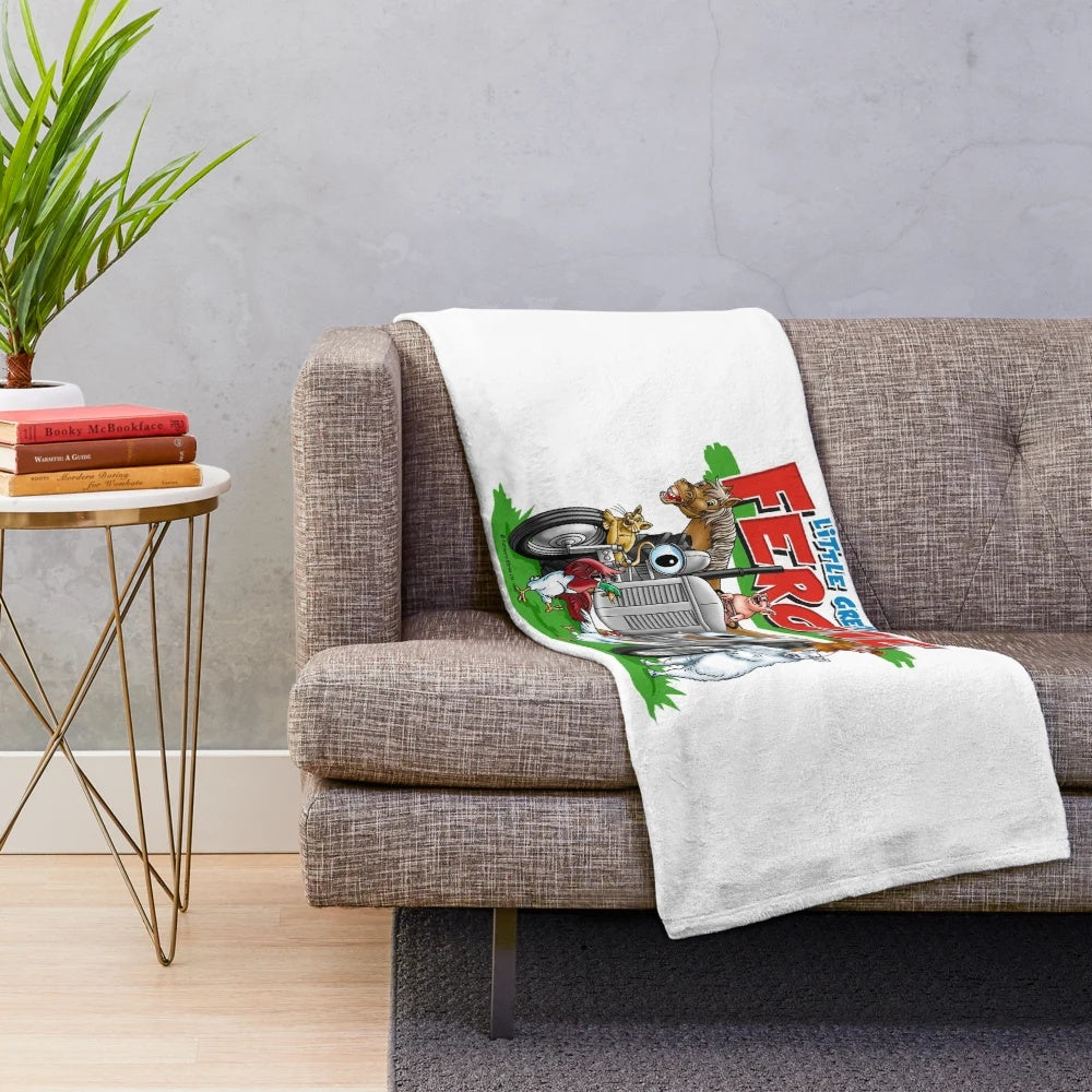 Plush blanket featuring a variety of farm animals including a tractor, horse, cat, sheep, cow, duck, hens, and pig