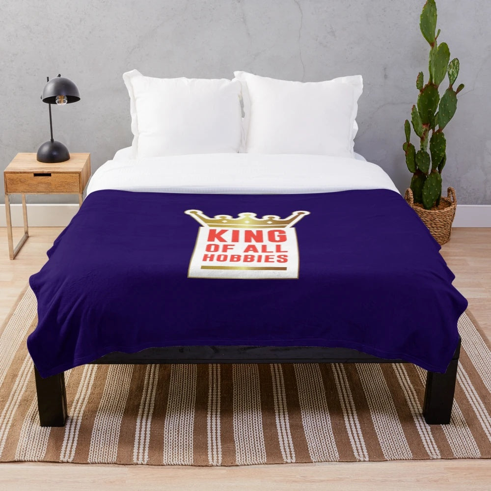 Plush blanket with "King of Hobbies" design