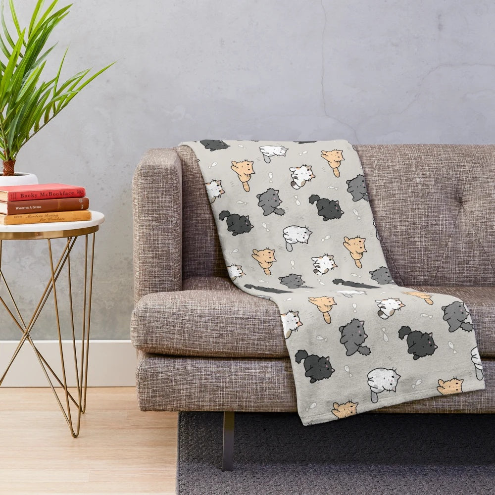 Soft and plush blanket featuring a cute kitten and fish pattern
